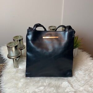 Nine West black leather medium size shoulder/sling bag